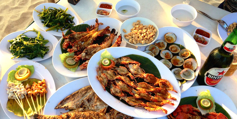 Jimbaran’s Seafood Feasts at Sunset: A Taste of Bali’s Ocean Bounty